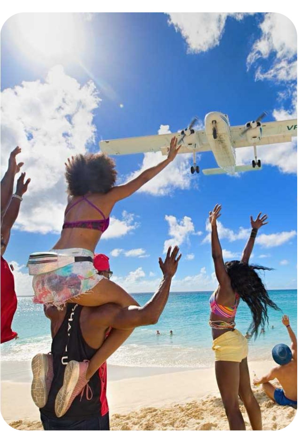 Residents of Sint Maarten celebrating on the beach